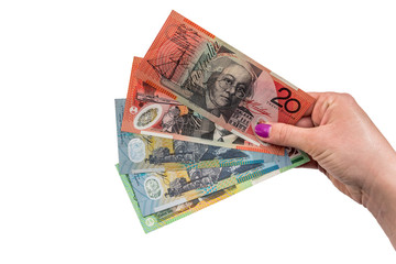 australian dollar in woman hand isolated on white