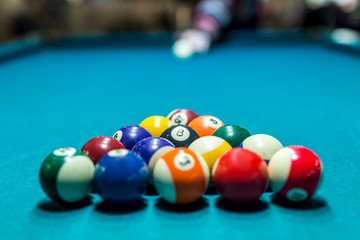 Billiard balls in triangle shape, ready to play