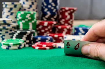 Close up of two aces combination on chips background