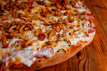 pizza on wooden background