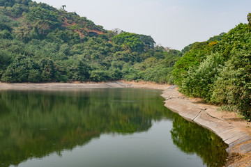 artificial lake near of two mountain.