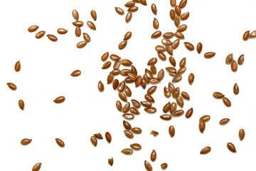 Flax seeds on the white background