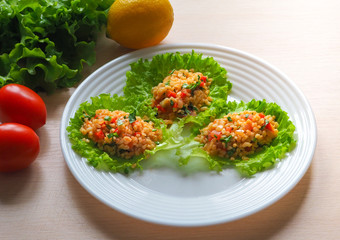 Kisir Turkish salad of bulgur with vegetables.
