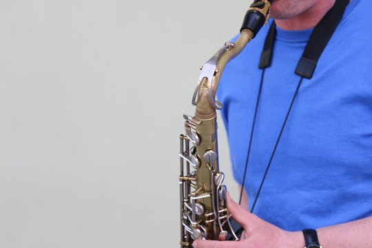 Boy playing the saxophone