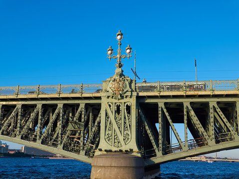 Fototapeta Details of the Trinity Bridge (Troitskiy Most in Russian) in Saint Petersburg, Russia. This bridge across the Neva River is a landmark of Art Nouveau design