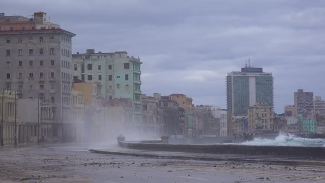 The waterfront promenade of the Malecon in Havana Cuba takes a beating during a huge winter storm.