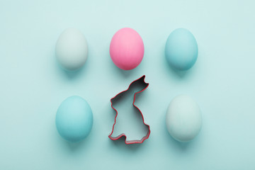 minimal Easter eggs & Easter bunny on blue