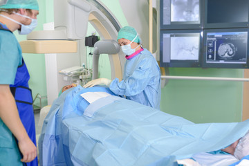 patient and surgeons before an operation