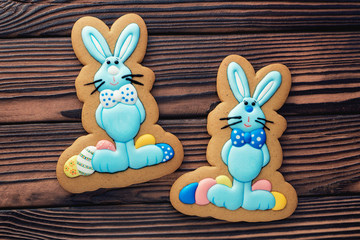 Glazed Easter gingerbread on a dark wooden table