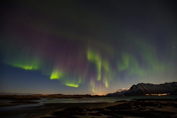 Fototapeta na wymiar Northern Lights (Aurora Borealis) over Lofoten, Norway.