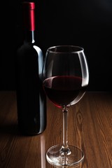 Bottle and Glass of Red Wine