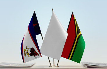 Flags of American Samoa and Vanuatu with a white flag in the middle