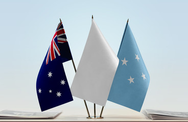 Flags of Australia and Federated States of Micronesia with a white flag in the middle