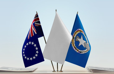 Flags of Cook Islands and Northern Mariana Islands with a white flag in the middle