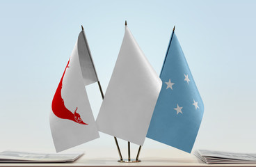 Flags of Easter Island and Federated States of Micronesia with a white flag in the middle