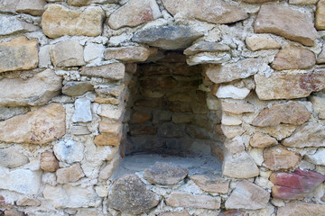 Hole in a stone wall