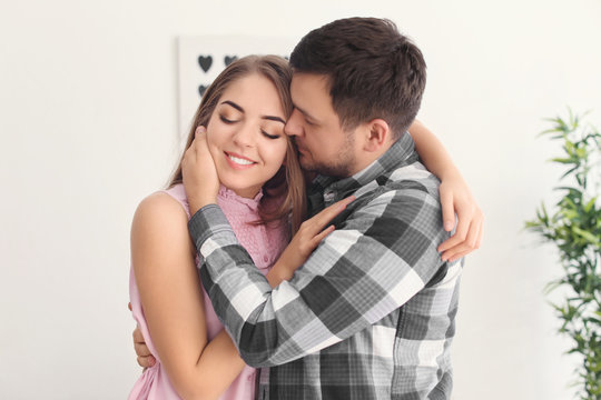 Cute young lovely couple at home