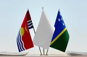 Flags of Kiribati and Solomon Islands with a white flag in the middle