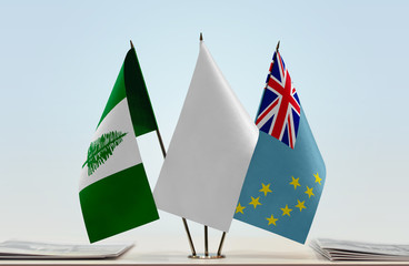 Flags of Norfolk Island and Tuvalu with a white flag in the middle