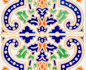Traditional ornamental Spanish decorative tiles, original ceramic tiles on the walls of buildings
