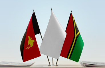 Flags of Papua New Guinea and Vanuatu with a white flag in the middle