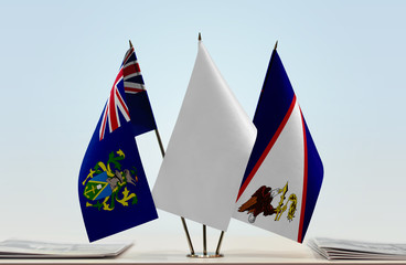 Flags of Pitcairn Islands and American Samoa with a white flag in the middle