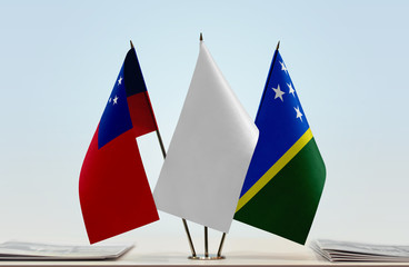 Flags of Samoa and Solomon Islands with a white flag in the middle