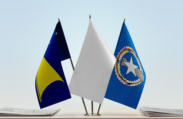 Flags of American Samoa and Northern Mariana Islands with a white flag in the middle