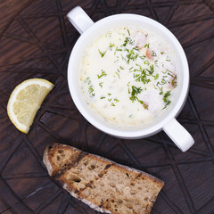 Close up cream soup in white bowl