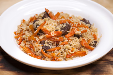 Rice pilaf with meat carrot and onion