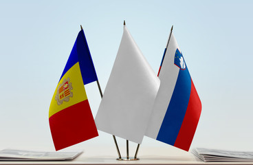 Flags of Andorra and Slovenia with a white flag in the middle