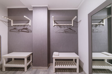 Stylish interior of changing room in gym