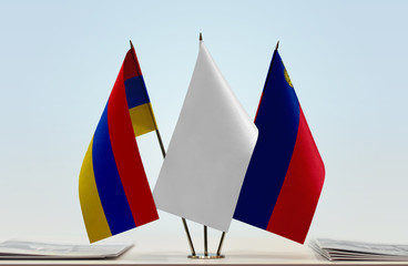 Flags of Armenia and Liechtenstein with a white flag in the middle