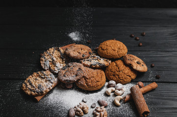 Homemade cookies dessert. Chocolate chip, oatmeal raisin, dough and nuts. Copy text menu food background.
