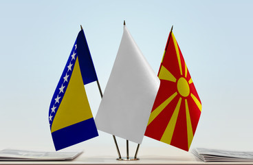 Flags of Bosnia and Herzegovina and Macedonia with a white flag in the middle