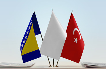 Flags of Bosnia and Herzegovina and Turkey with a white flag in the middle