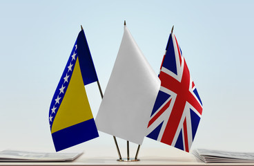 Flags of Bosnia and Herzegovina and Great Britain with a white flag in the middle