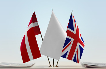 Flags of Denmark and Great Britain with a white flag in the middle
