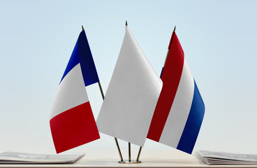 Flags of France and Netherlands with a white flag in the middle