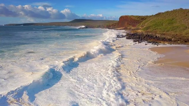 Slow motion aerial over the northwest coast of Molokai, Hawaii.