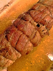 Roasted meat taken out of the oven 