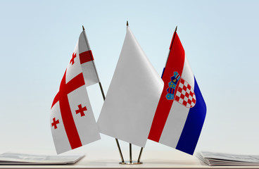 Flags of Georgia (country) and Croatia with a white flag in the middle
