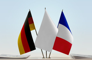 Flags of Germany and France with a white flag in the middle