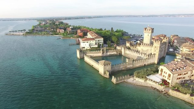erial view. The Scaliger Castle in Sirmione. Lake Garda, Italy. 4K.