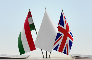 Flags of Hungary and Great Britain with a white flag in the middle