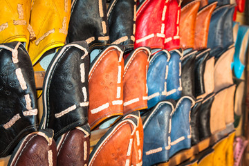 Shoes on a shoe stall on the market in Essaouira, Morocco