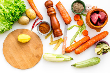 Diet vegetarian vegan food. Ratatouille or vegetable ragout. White table background top view