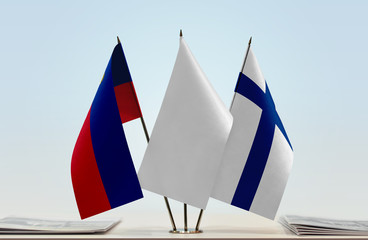 Flags of Liechtenstein and Finland with a white flag in the middle