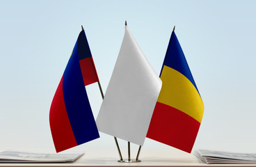 Flags of Liechtenstein and Romania with a white flag in the middle