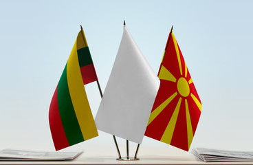 Flags of Lithuania and Macedonia with a white flag in the middle